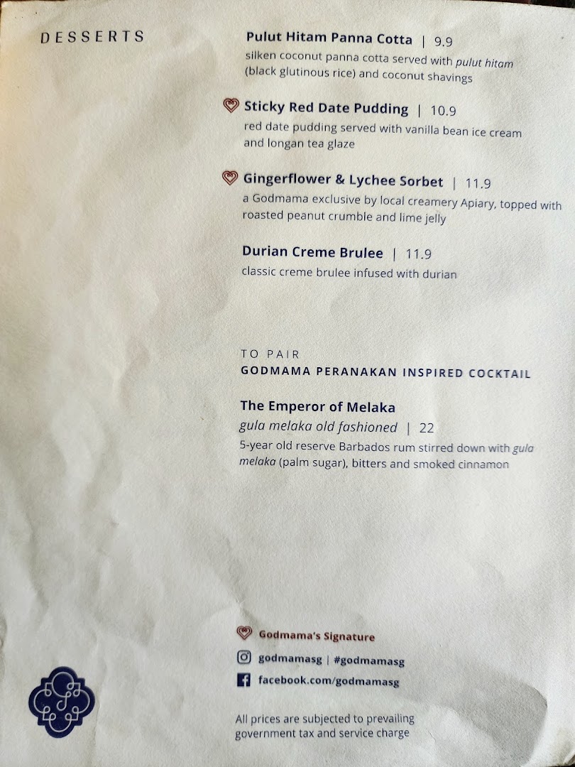 A close-up of Godmama's dessert and cocktail menu, featuring Peranakan-inspired dishes.