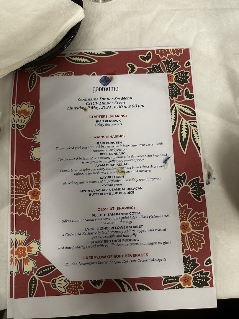 A detailed view of Godmama's Dinner Set Menu for a special event.