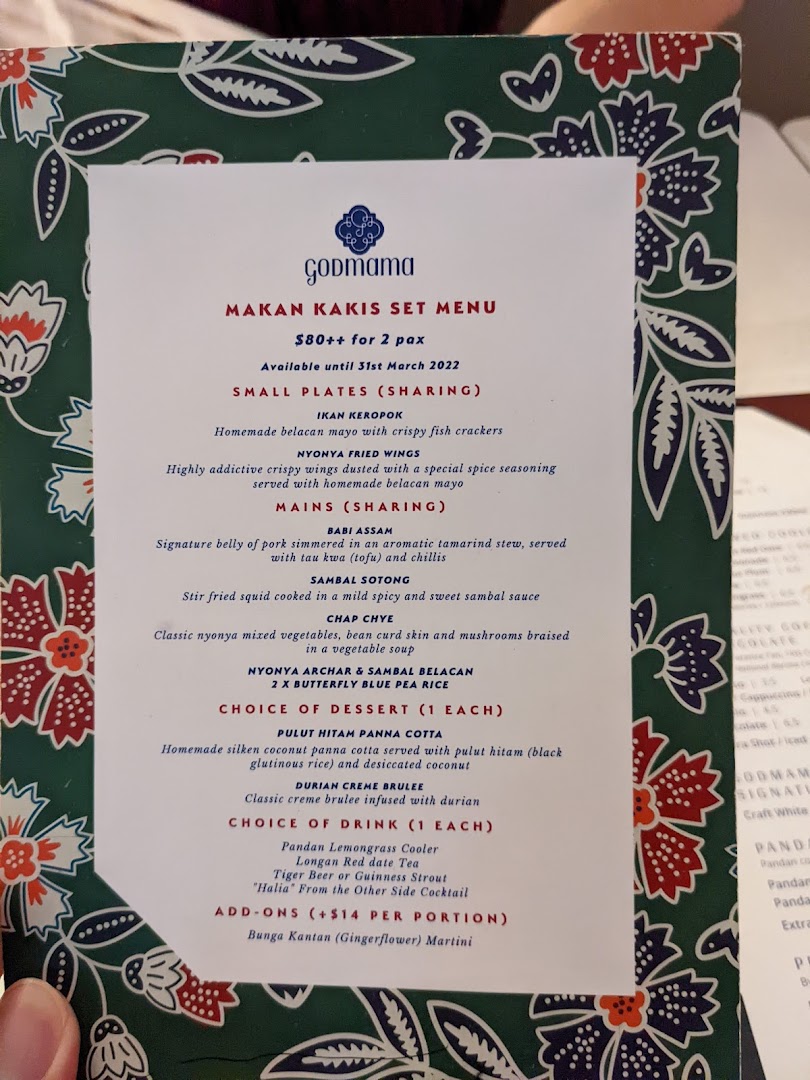 A detailed menu for Godmama's Makan Kakis Set Menu, featuring Peranakan dishes and drinks.
