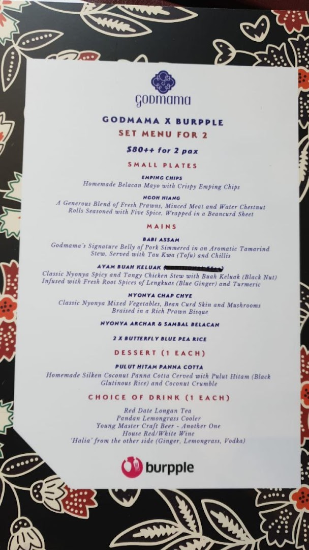 A detailed view of Godmama's special set menu for two, featuring authentic Peranakan dishes.