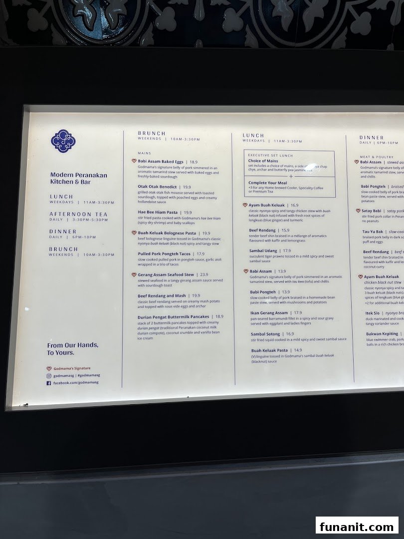 A brightly lit display board showcasing the menu and operating hours of a Modern Peranakan restaurant.