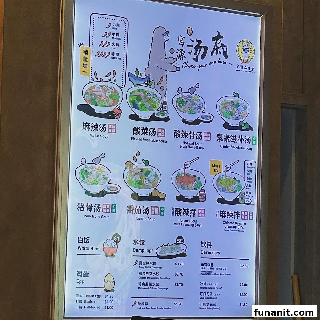 A brightly lit menu board showcasing various soup bases, dumplings, and beverages at Gong Yuan Mala Tang.