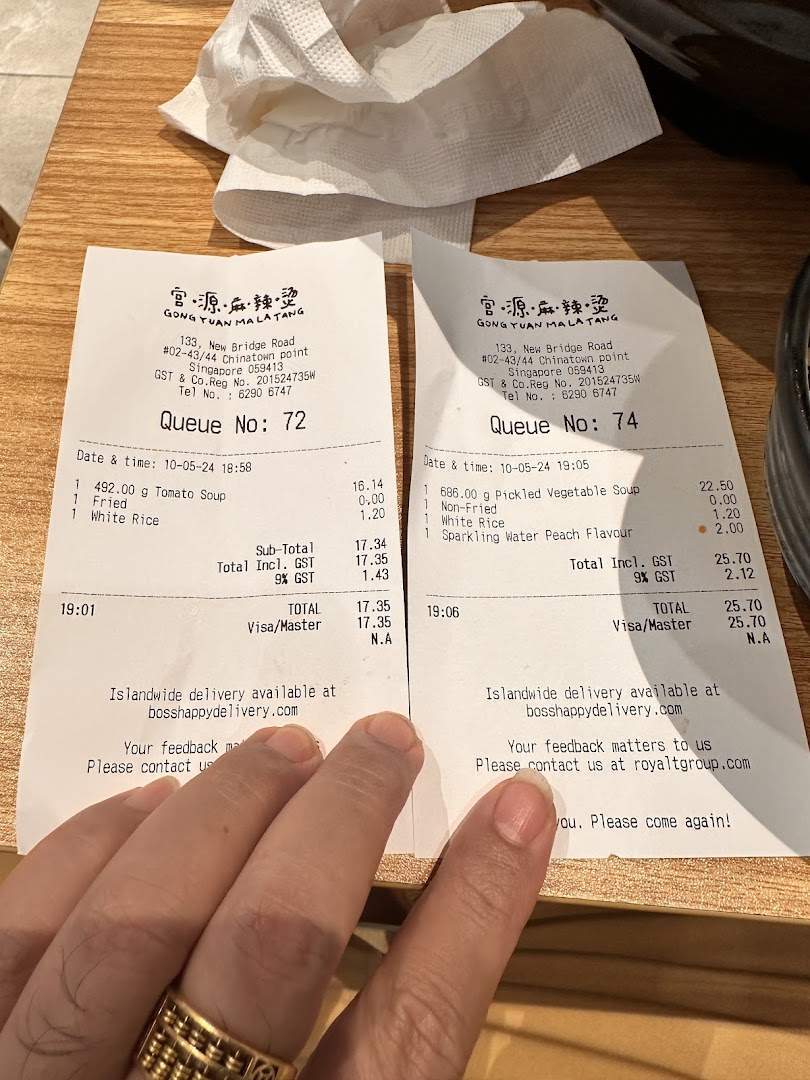 Two receipts from Gong Yuan Ma La Tang showing detailed food orders and prices.