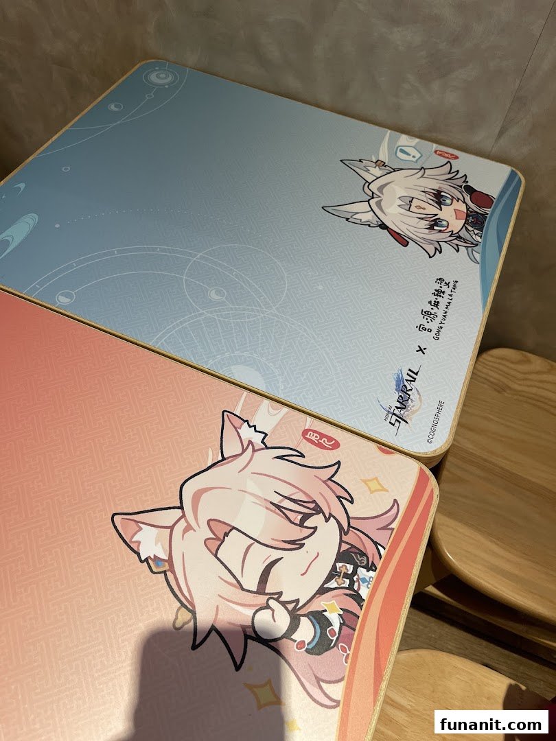 Two tabletops featuring anime character designs, likely from a Honkai: Star Rail collaboration, inside Gong Yuan Ma La Tang.