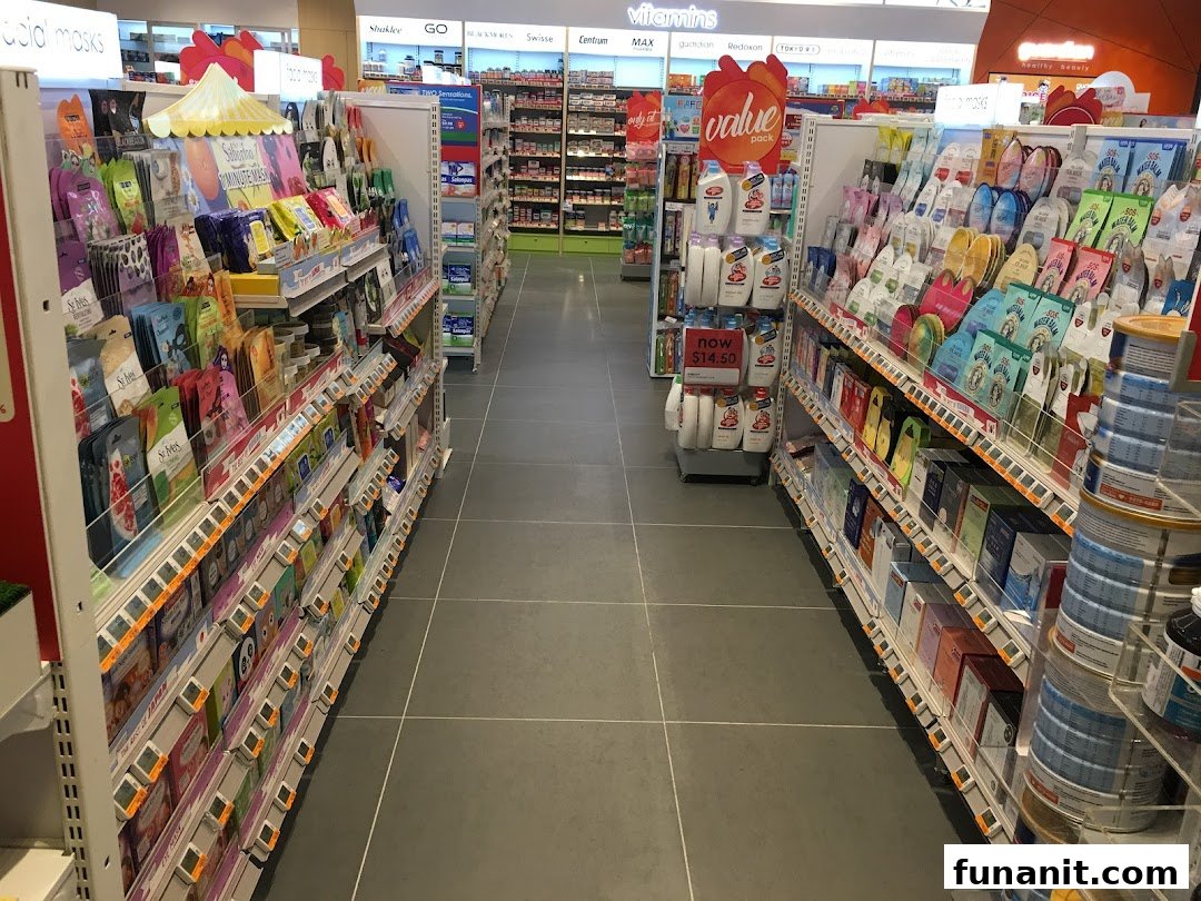 An interior view of Guardian Health & Beauty, showcasing aisles filled with health and beauty products.