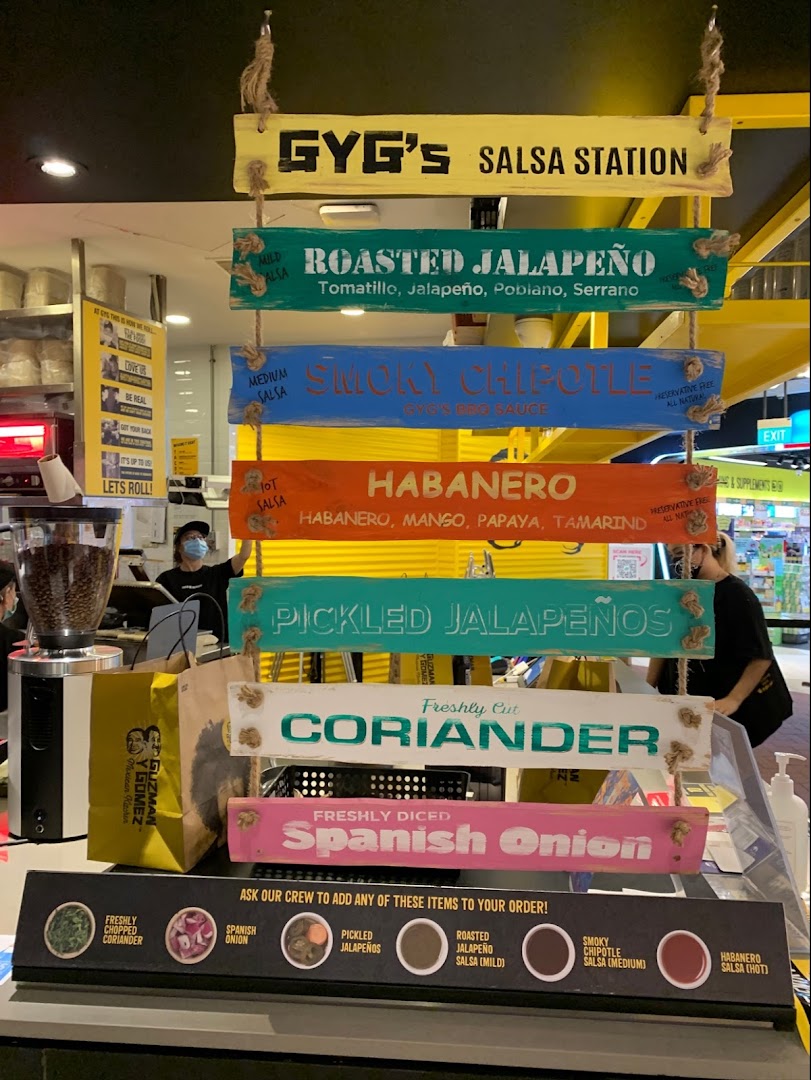 Guzman y Gomez's 'Salsa Station' showcasing fresh salsa and topping options for customization.