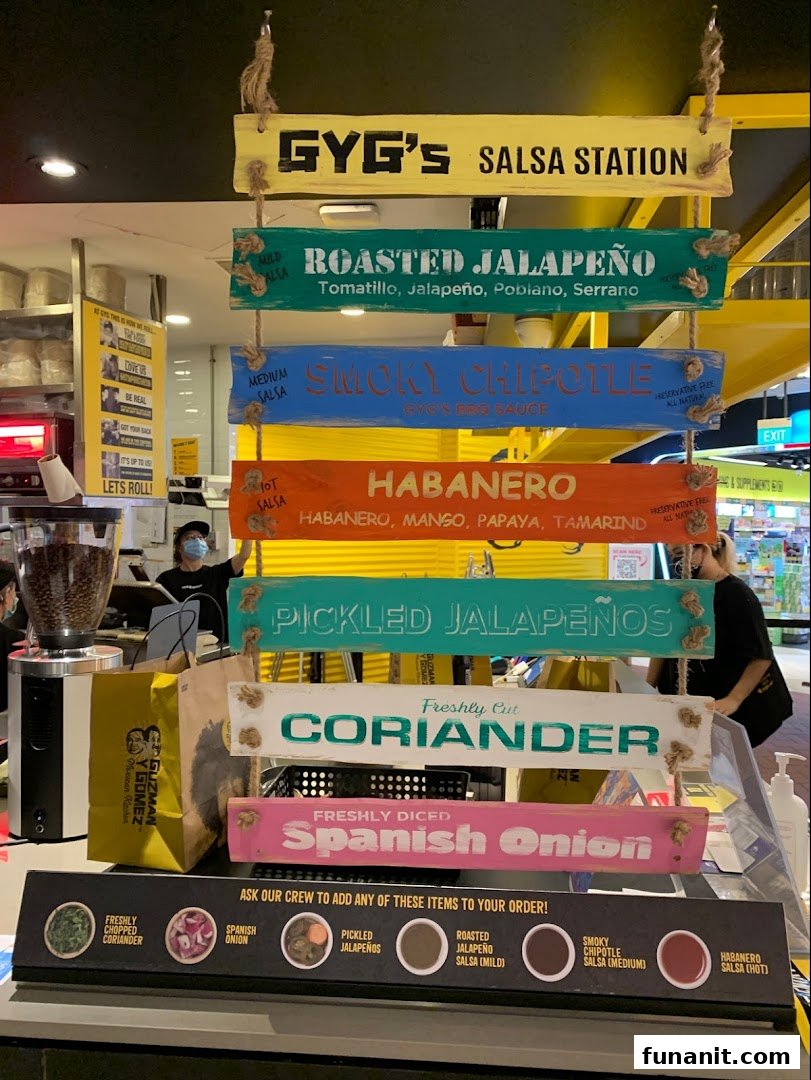 Guzman y Gomez's 'Salsa Station' showcasing fresh salsa and topping options for customization.