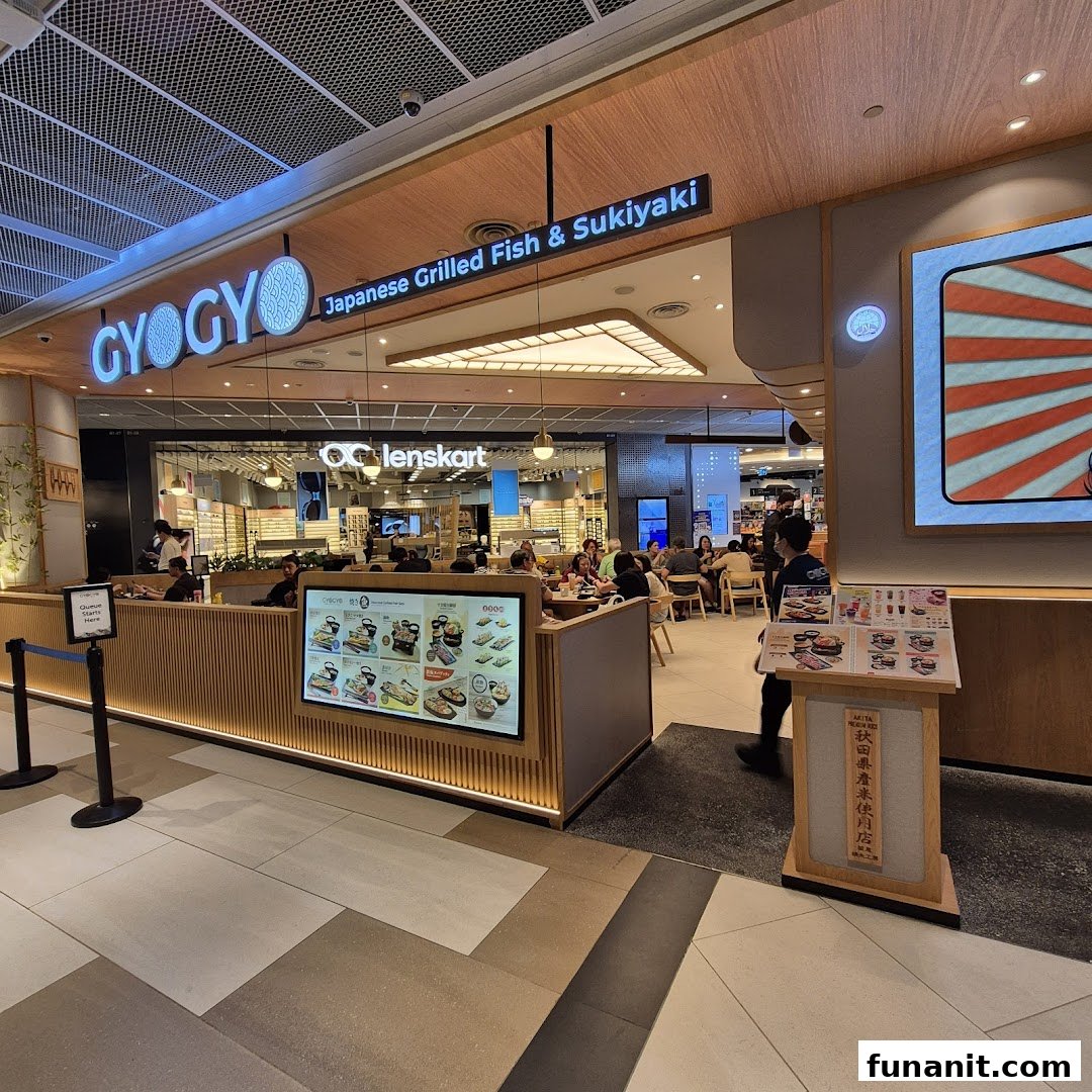 The shopfront of GyoGyo Japanese Grilled Fish & Sukiyaki, showcasing its entrance and inviting interior.