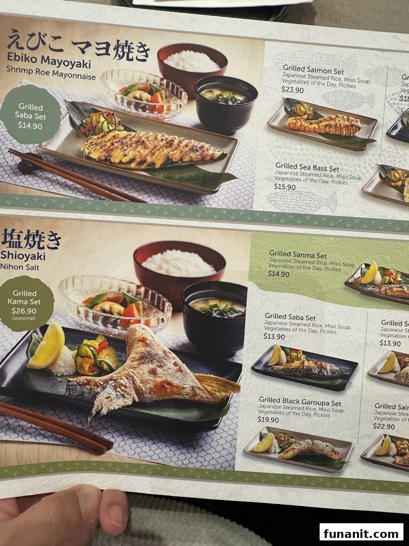 A close-up view of GyoGyo's menu featuring various Japanese grilled fish sets.