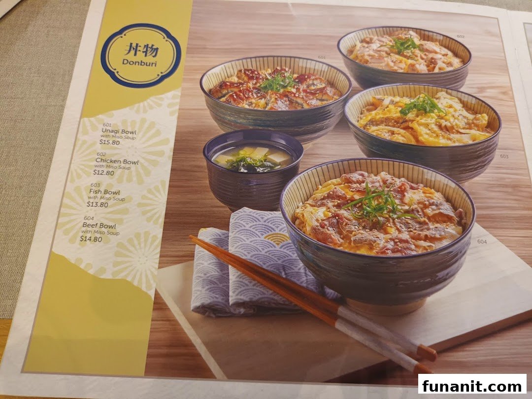 A menu page from GyoGyo Japanese Grilled Fish Sukiyaki, showcasing various Donburi bowls with prices.