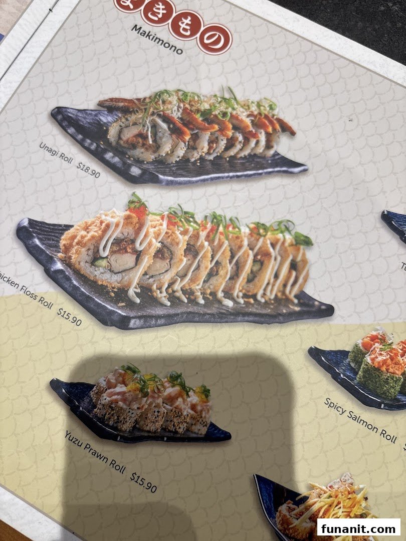A menu page showcasing various Japanese sushi rolls, including Unagi, Chicken Floss, and Yuzu Prawn rolls.