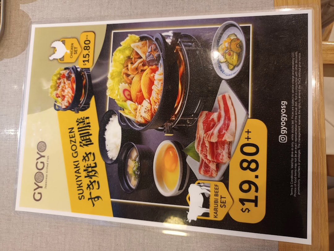 A menu displaying Sukiyaki Gozen sets, including Chicken and Karubi Beef options with prices.