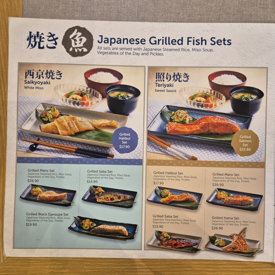 A detailed menu page showcasing various Japanese grilled fish sets with prices and descriptions.