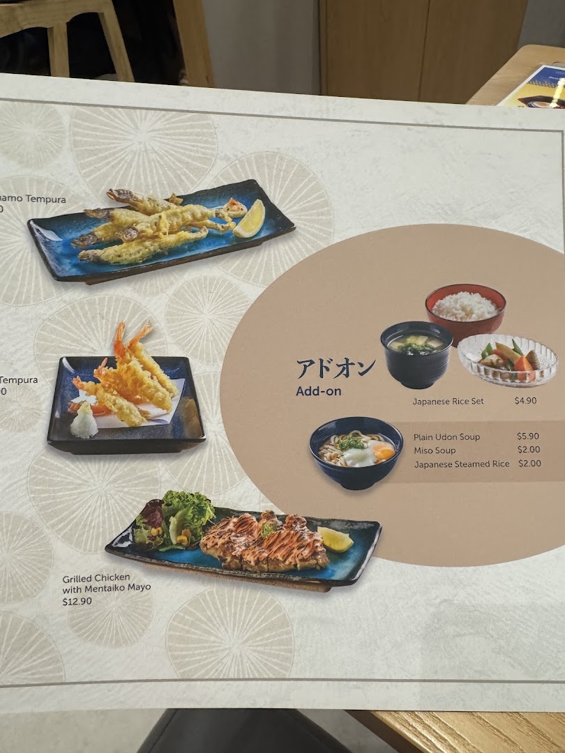 A menu page from GyoGyo Japanese restaurant, showcasing tempura, grilled chicken, and add-on options.