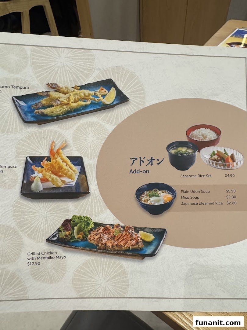 A menu page from GyoGyo Japanese restaurant, showcasing tempura, grilled chicken, and add-on options.
