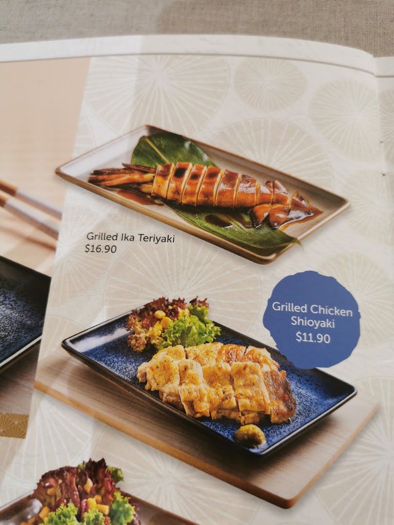 A menu page displaying Grilled Ika Teriyaki and Grilled Chicken Shioyaki with their prices.