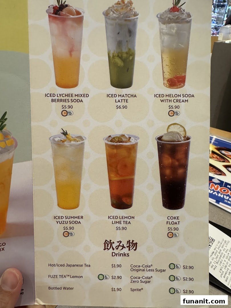 A vibrant menu displaying a variety of refreshing iced beverages and classic soft drinks.