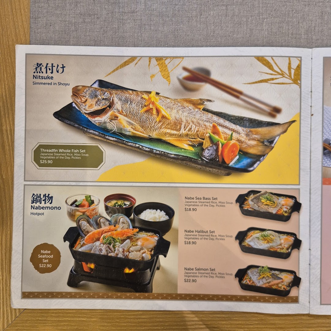 A menu page showcasing Japanese Nitsuke (simmered fish) and Nabemono (hotpot) sets with prices.
