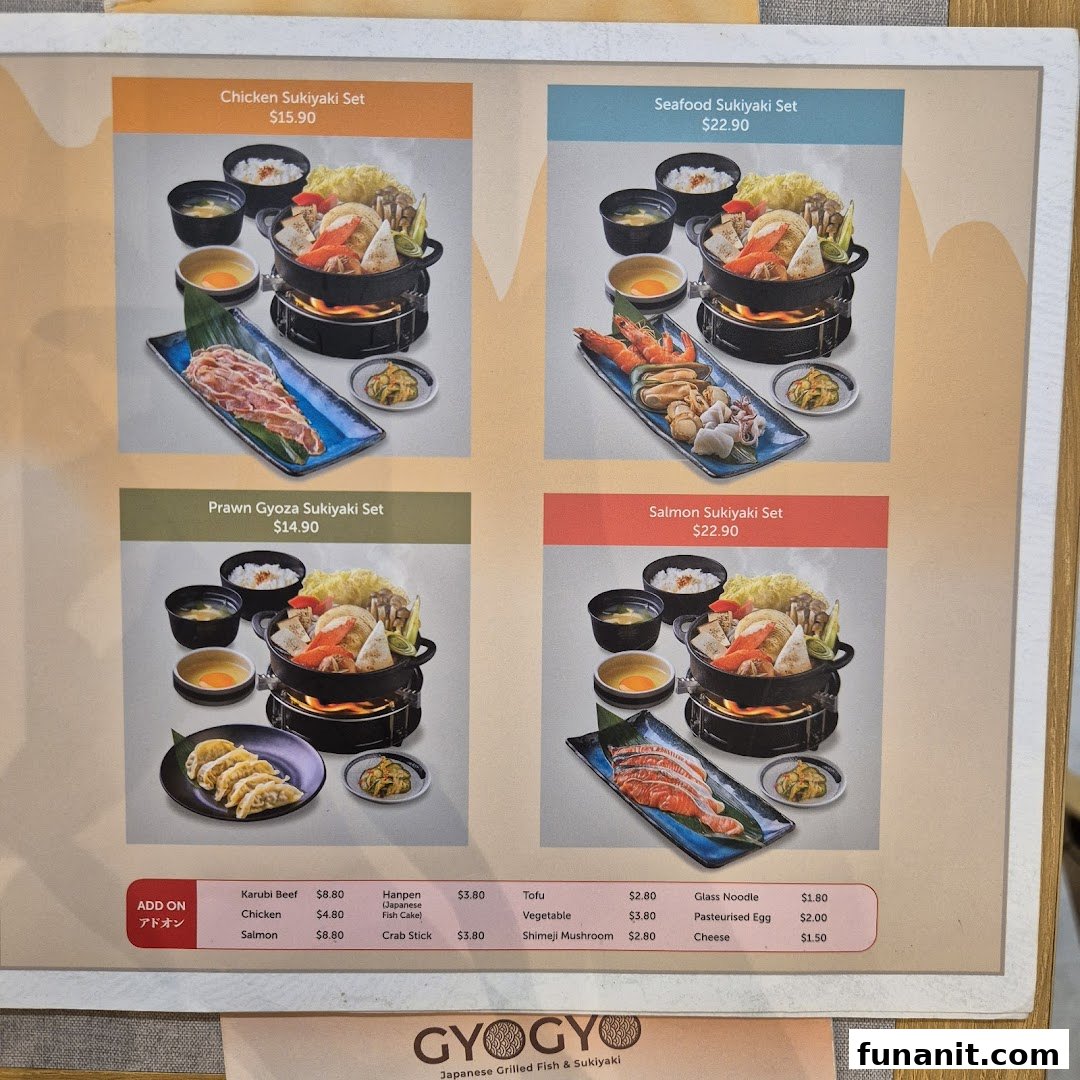 A menu board displaying various sukiyaki sets and add-on options with prices at GyoGyo.