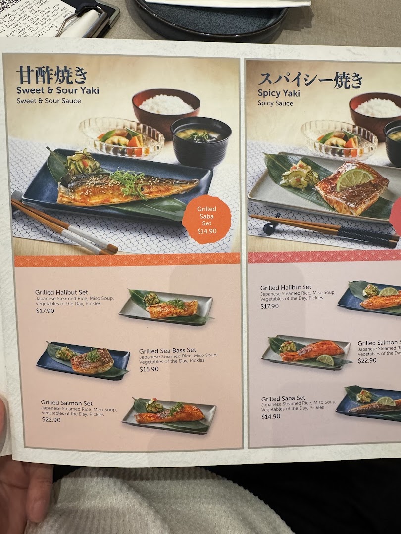 A detailed menu page from GyoGyo, showcasing various Japanese grilled fish sets with prices and descriptions.