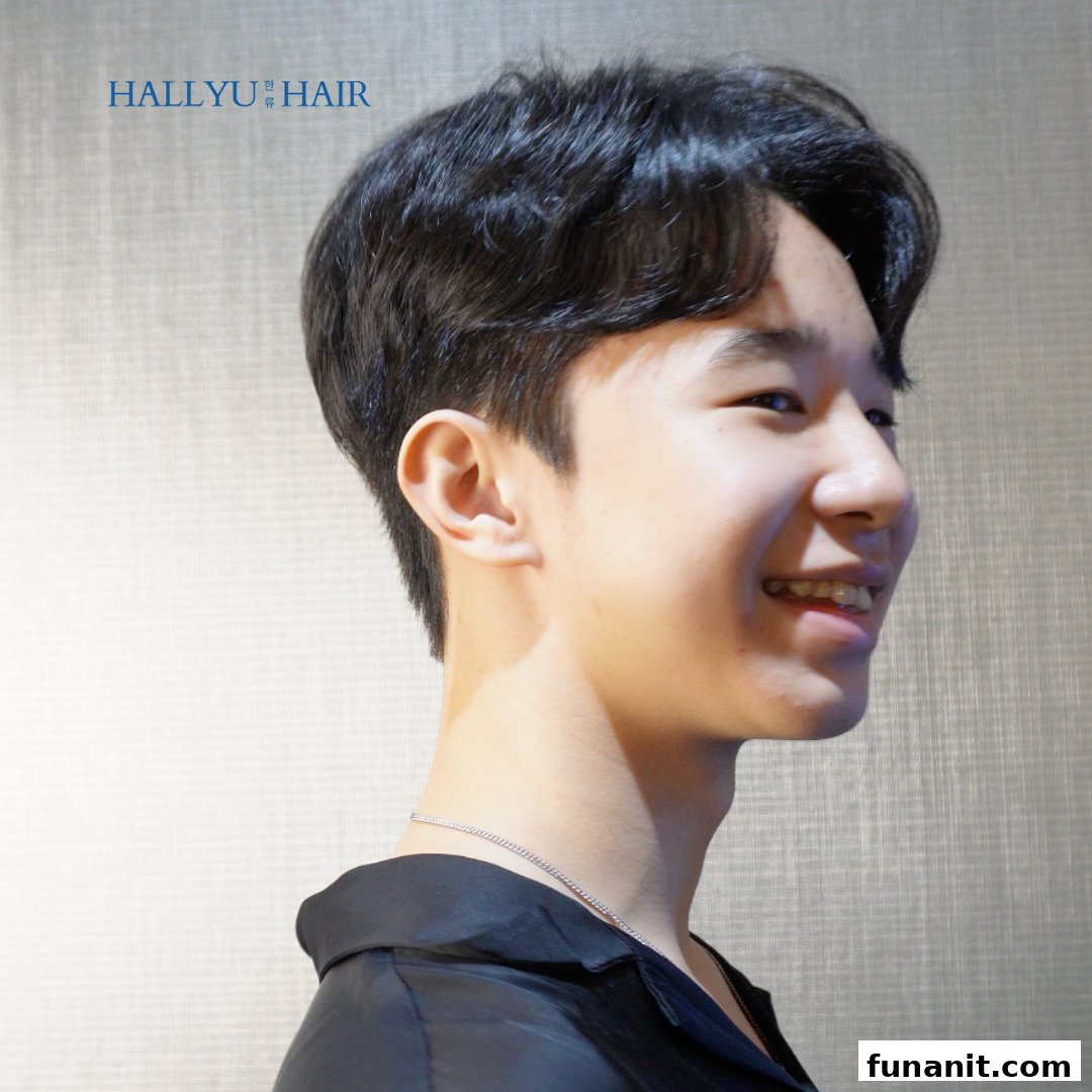 A young man with a stylish, modern Korean-inspired haircut, showcasing Hallyu Hair's expertise.