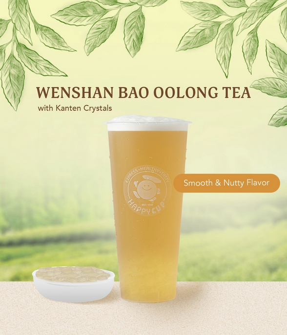 A tall glass of Wenshan Bao Oolong Tea with Kanten Crystals, highlighting its smooth and nutty flavor.