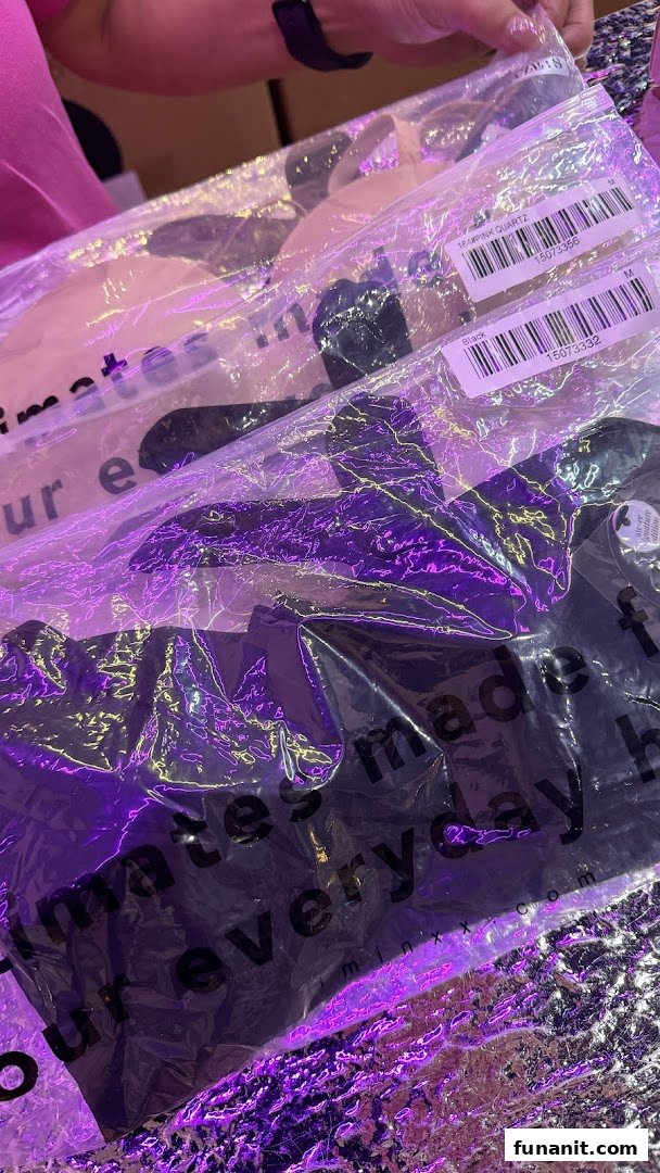 Close-up of IM IN IMINXX intimate wear in clear packaging, showing product details and colors.
