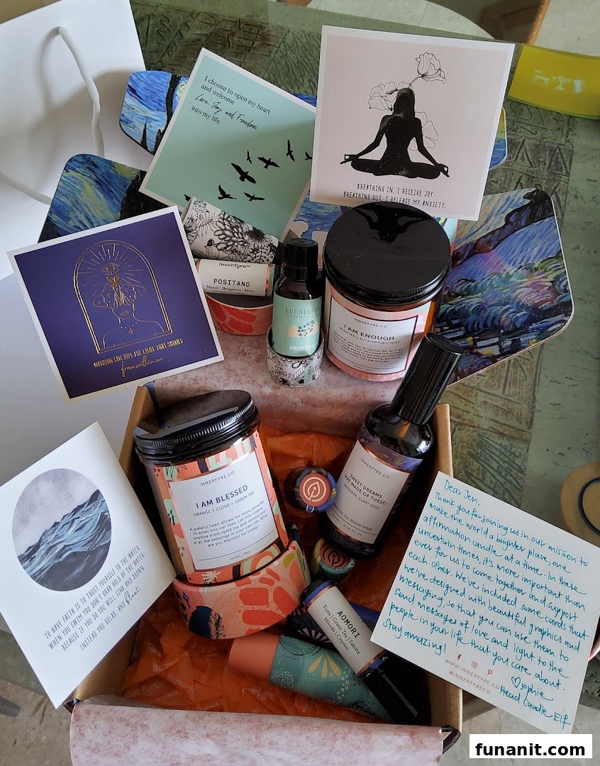A curated box of Innerfyre Co. wellness products, including affirmation candles, essential oils, and inspirational cards.