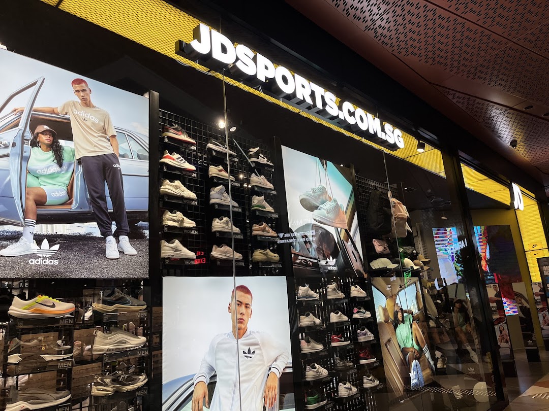 The vibrant storefront of JD Sports showcases a wide array of athletic footwear and apparel.