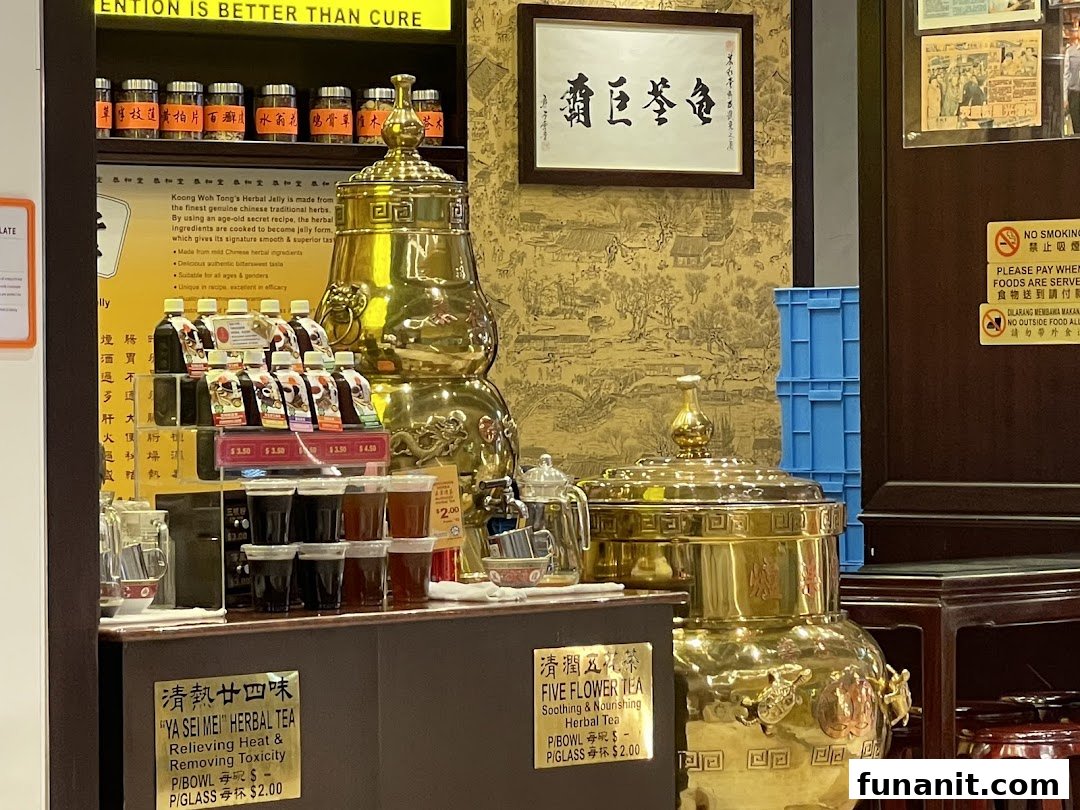 A counter at Koong Woh Tong featuring traditional Chinese herbal jelly, bottled drinks, and teas.
