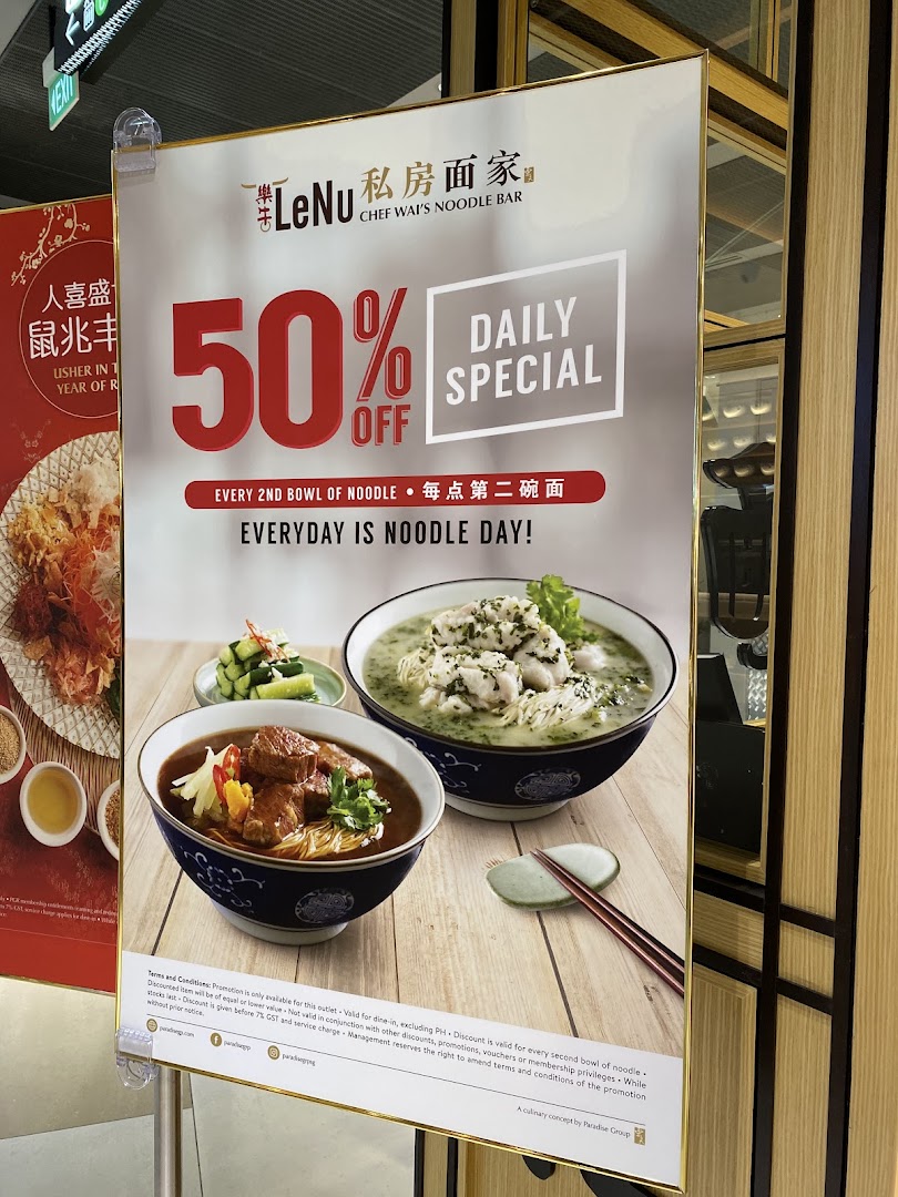 A promotional poster for LeNu Chef Wai's Noodle Bar, highlighting a 50% off daily noodle special.