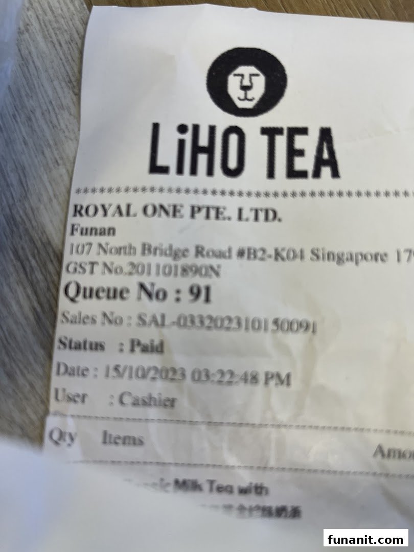 A close-up view of a LiHO TEA receipt showing transaction details and store information.