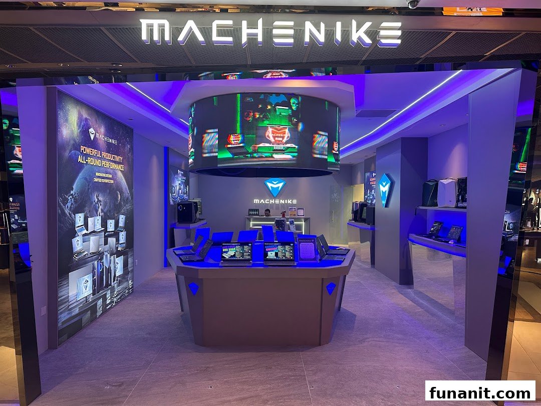 The Machenike Experience Store entrance, showcasing gaming laptops, desktops, and a large circular display.