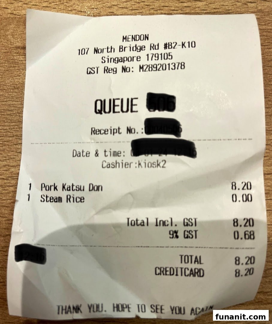 A detailed receipt from Mendon, showing a purchase of Pork Katsu Don and Steam Rice.