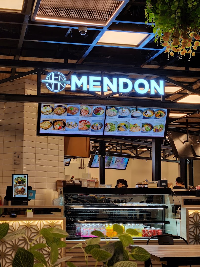 A digital menu board at Mendon showcasing various Japanese-inspired rice bowls and ramen dishes.