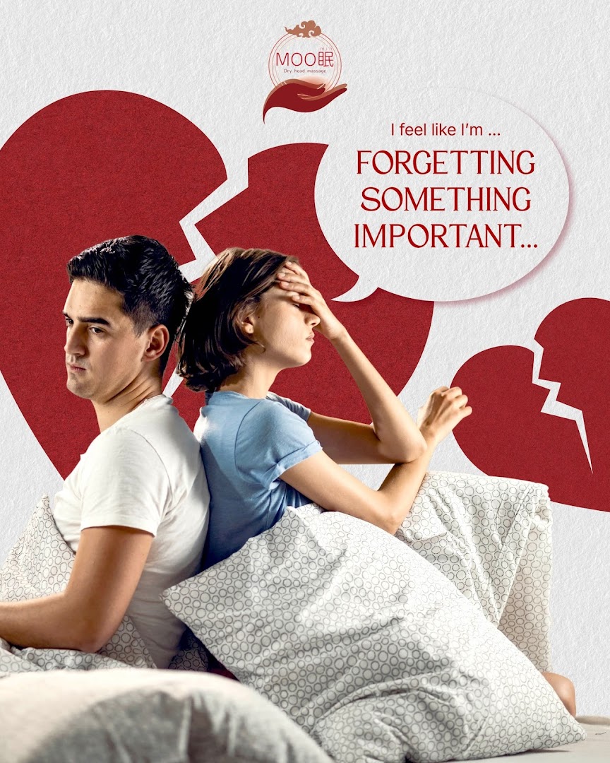 An advertisement showing a couple in bed with a broken heart graphic, promoting dry head massage for forgetfulness.