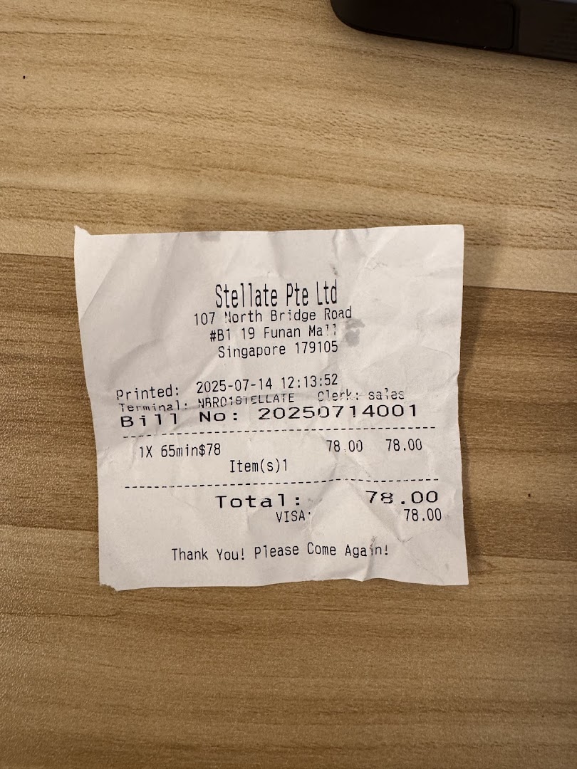 A receipt from Stellate Pte Ltd, detailing a 65-minute service transaction at Funan Mall.