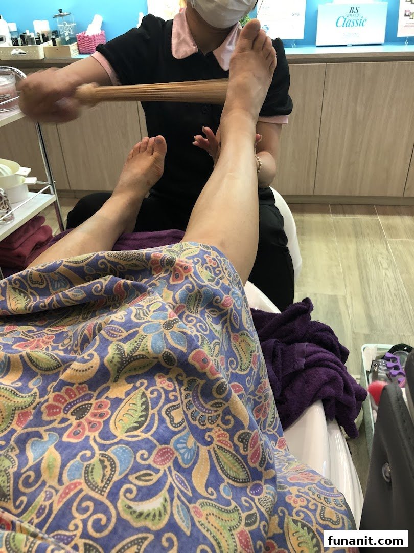 A customer receives a relaxing foot treatment from a therapist at Nailz Treats.
