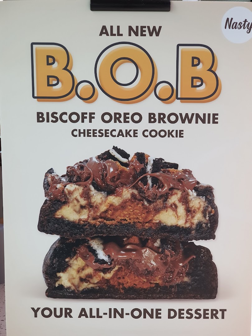 A promotional poster for Nasty Cookie's new B.O.B (Biscoff Oreo Brownie Cheesecake Cookie) dessert.