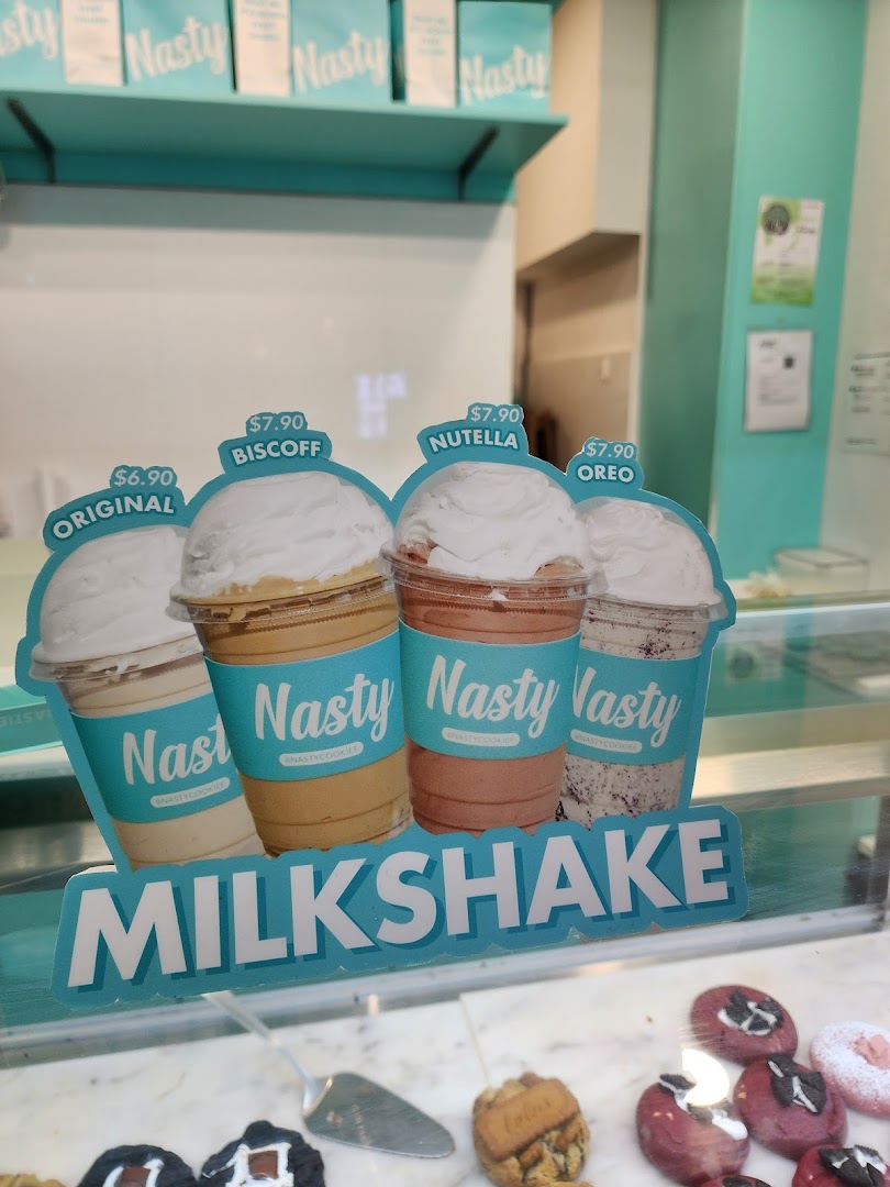 A vibrant display showcasing Nasty Cookie's milkshake offerings with their respective prices.