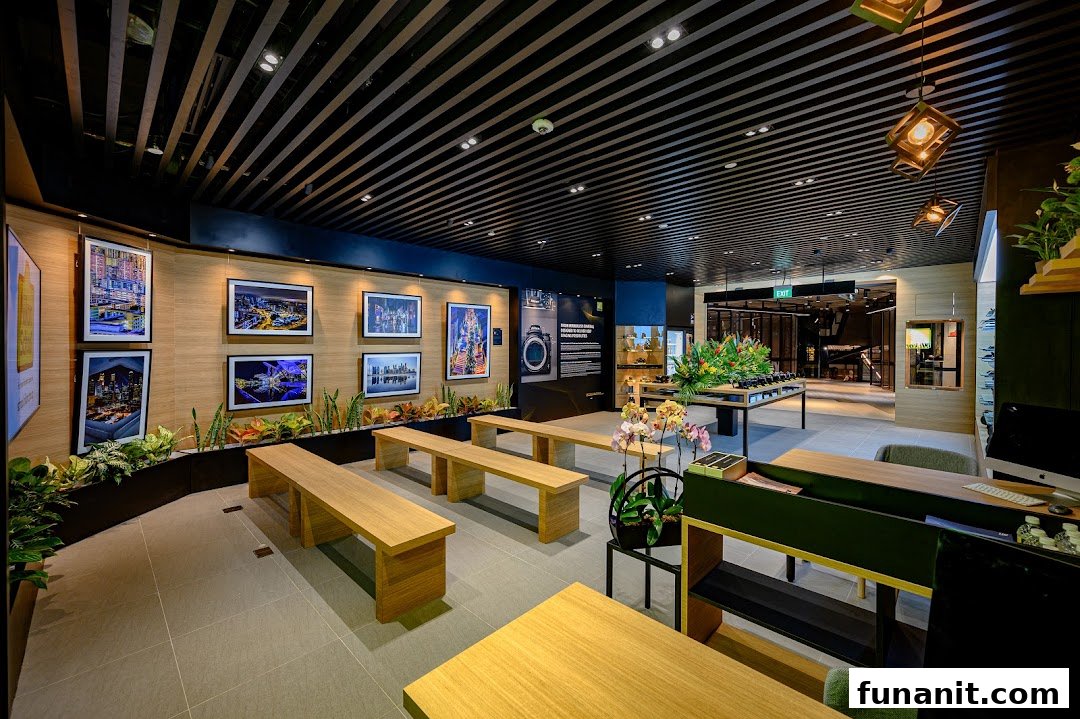 Modern interior of Nikon Experience Hub featuring photo displays, seating, and product showcases.