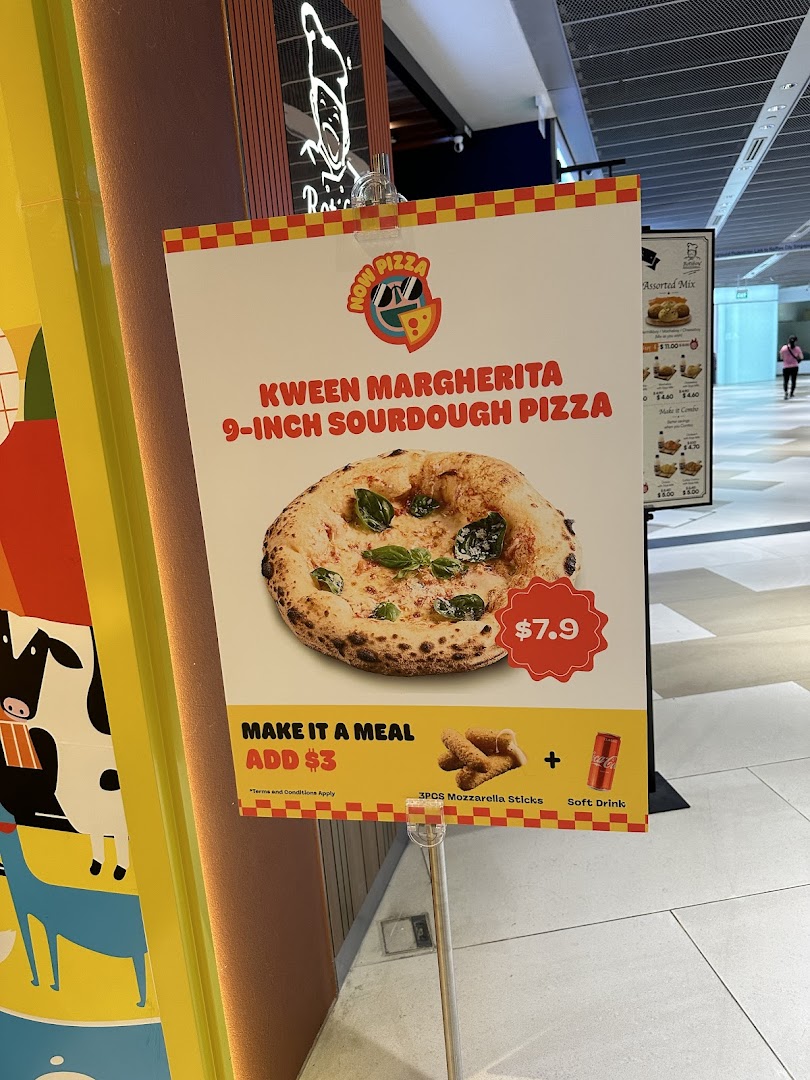 A promotional standee for Now Pizza's Kween Margherita sourdough pizza.