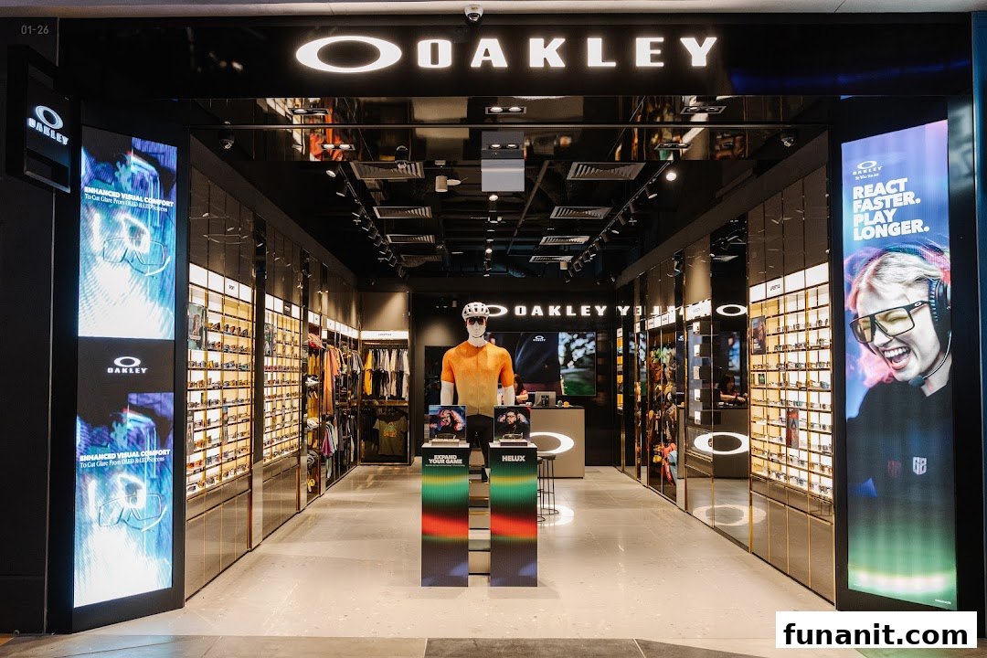 The brightly lit entrance of Oakley Funan, showcasing eyewear, apparel, and digital displays.