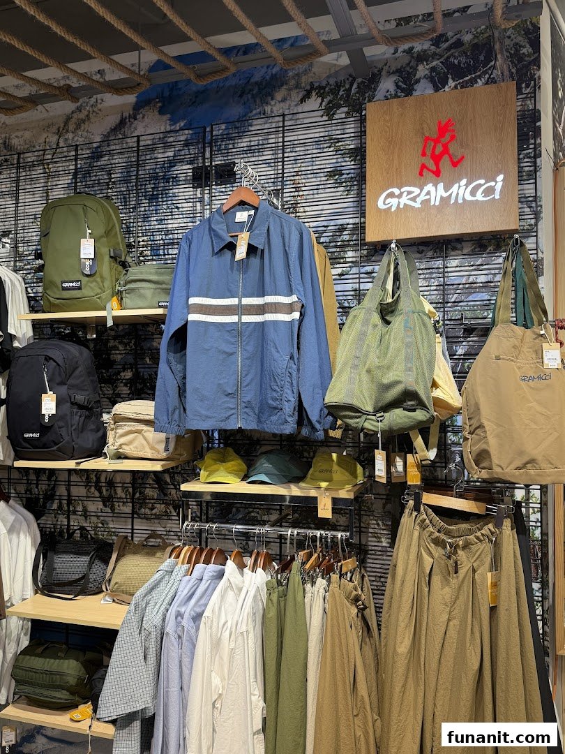Interior shot of Outdoor Life showcasing Gramicci apparel and accessories like jackets, shirts, pants, and bags.