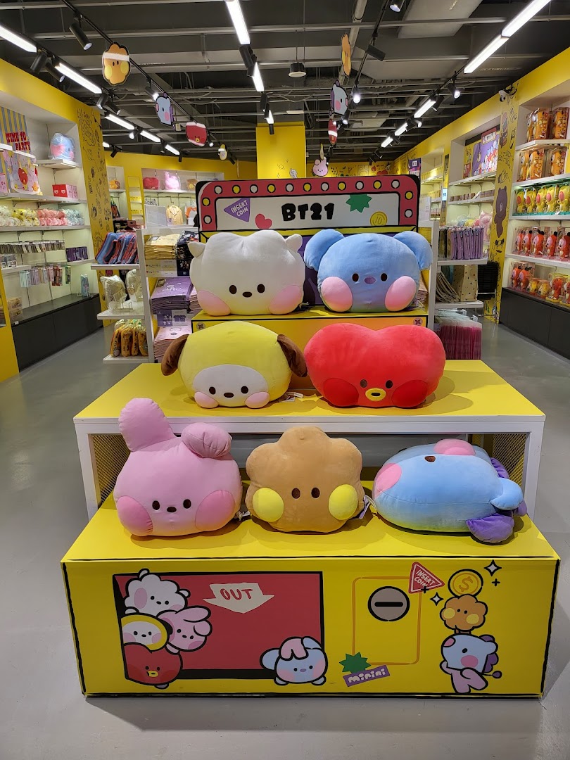 A vibrant display of BT21 character plush toys inside POP MART Funan, featuring various colorful designs.