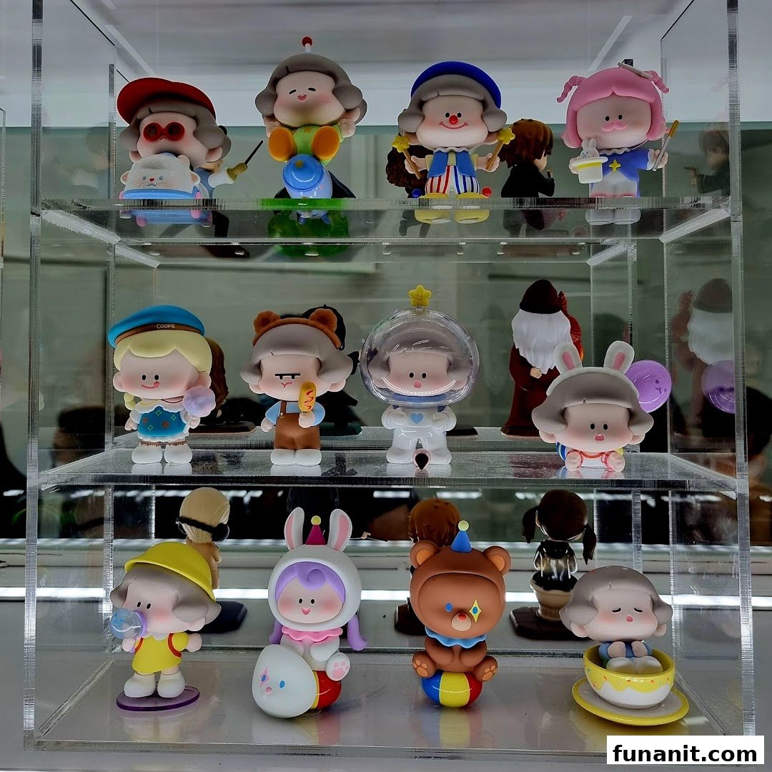 A clear display case showcasing various colorful, stylized collectible figures from POP MART.