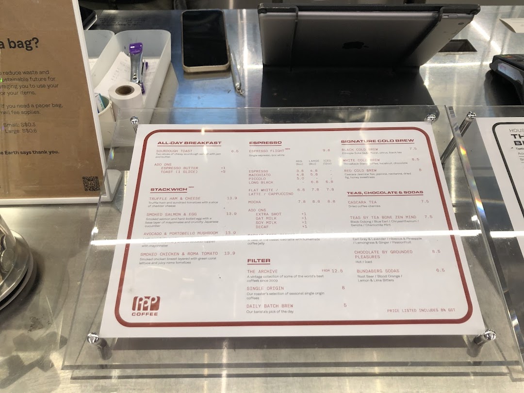 A detailed menu display for PPP Coffee, showcasing a variety of coffee, tea, and food items.