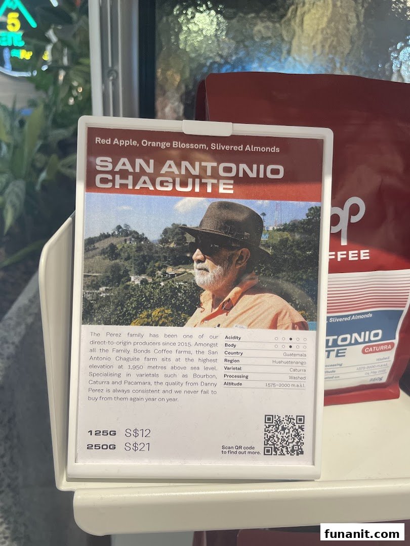 A detailed display card showcasing San Antonio Chaguite coffee beans with origin, tasting notes, and pricing.
