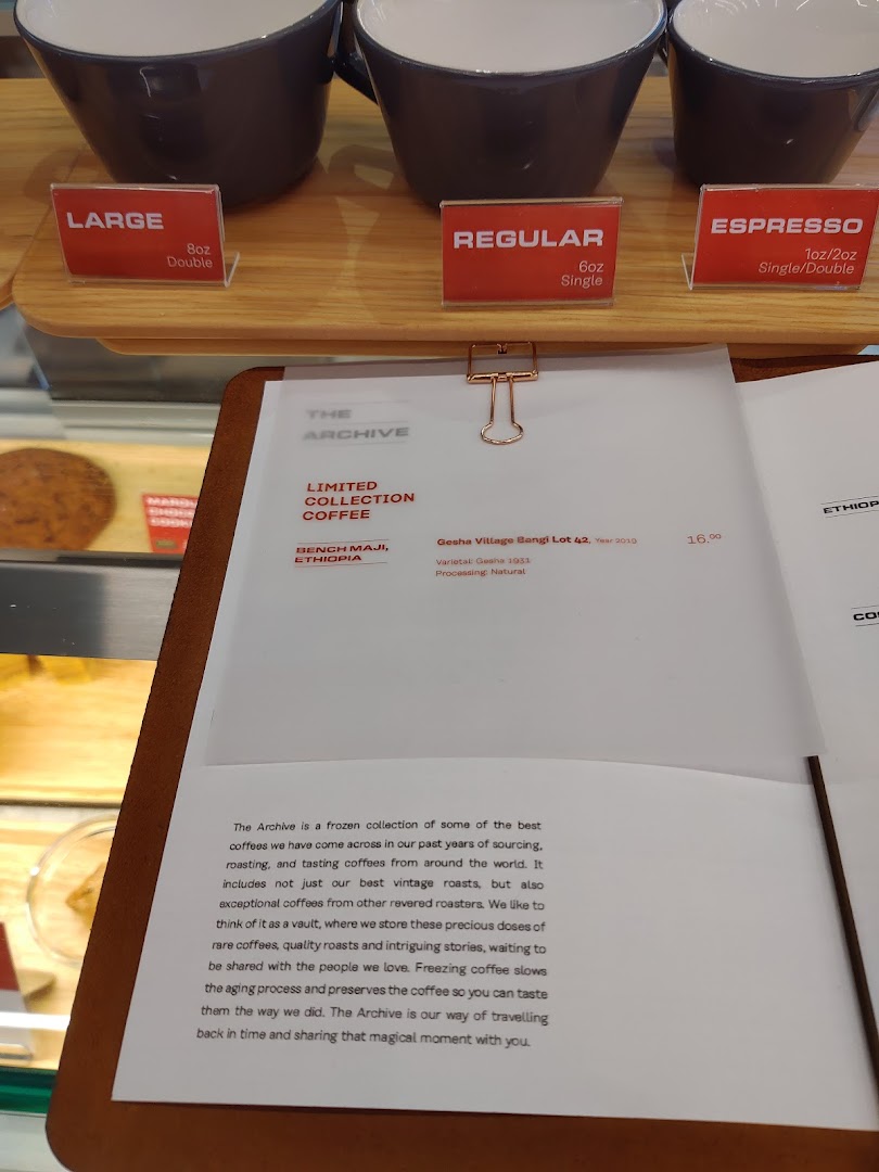 A detailed coffee menu from PPP Coffee, showcasing specialty beans and drink sizes.