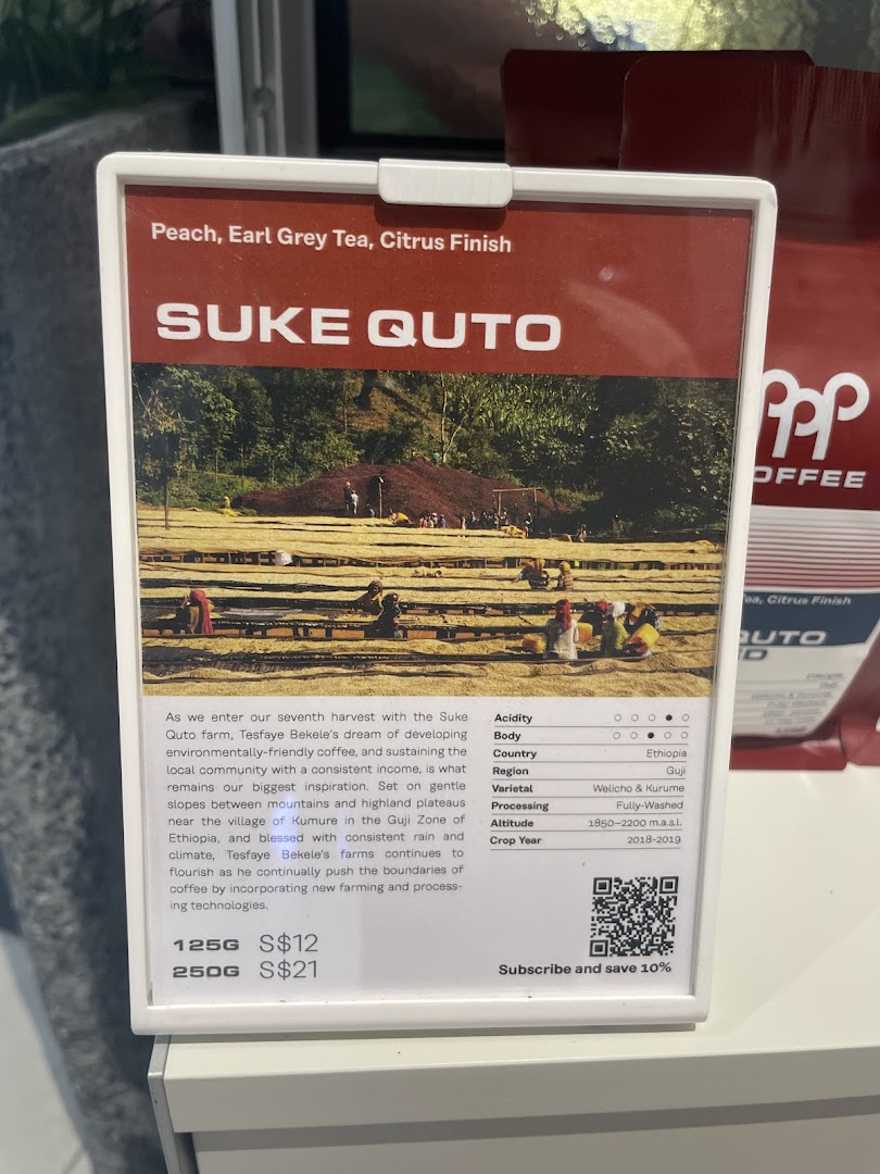 A detailed display card for PPP Coffee's Suke Quto coffee, showing origin, tasting notes, and pricing.